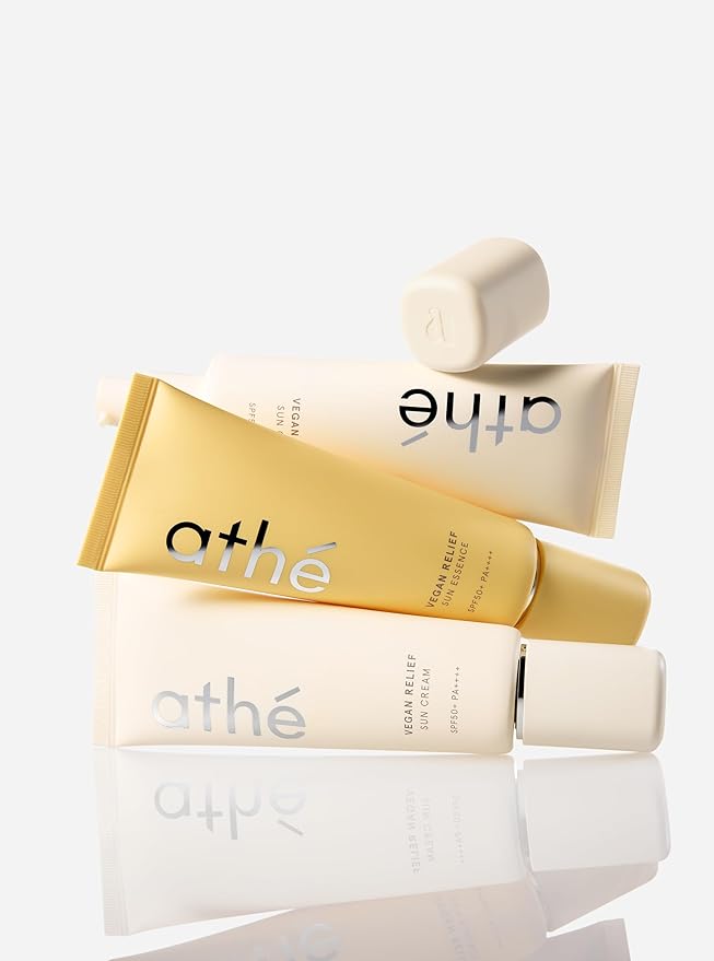 athé Vegan Relief Sun Cream SPF 50+ Broad Spectrum – Lightweight Hydrating Face Sunscreen, No White Cast, Includes Mini Tinted Lip Balm (04 Brave, 0.04 oz) | Vegan K-Beauty (1.69 fl oz)