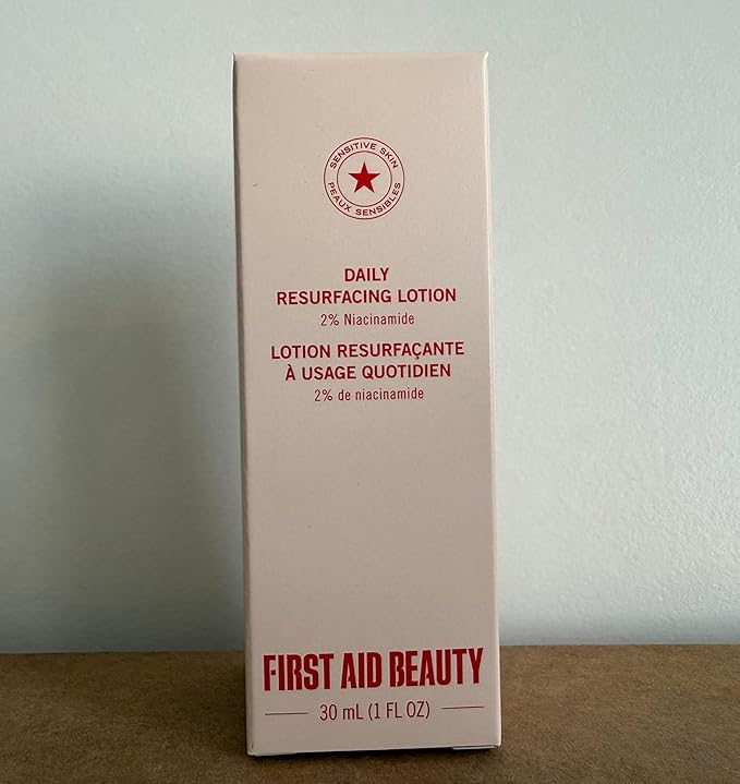 First Aid Beauty Lactic Acid Lotion for Acne-Prone Skin with 2% Niacinamide - Resurfacing Lotion Moisturizes & Visibly Diminishes Post-Acne Marks, (1.0 oz)